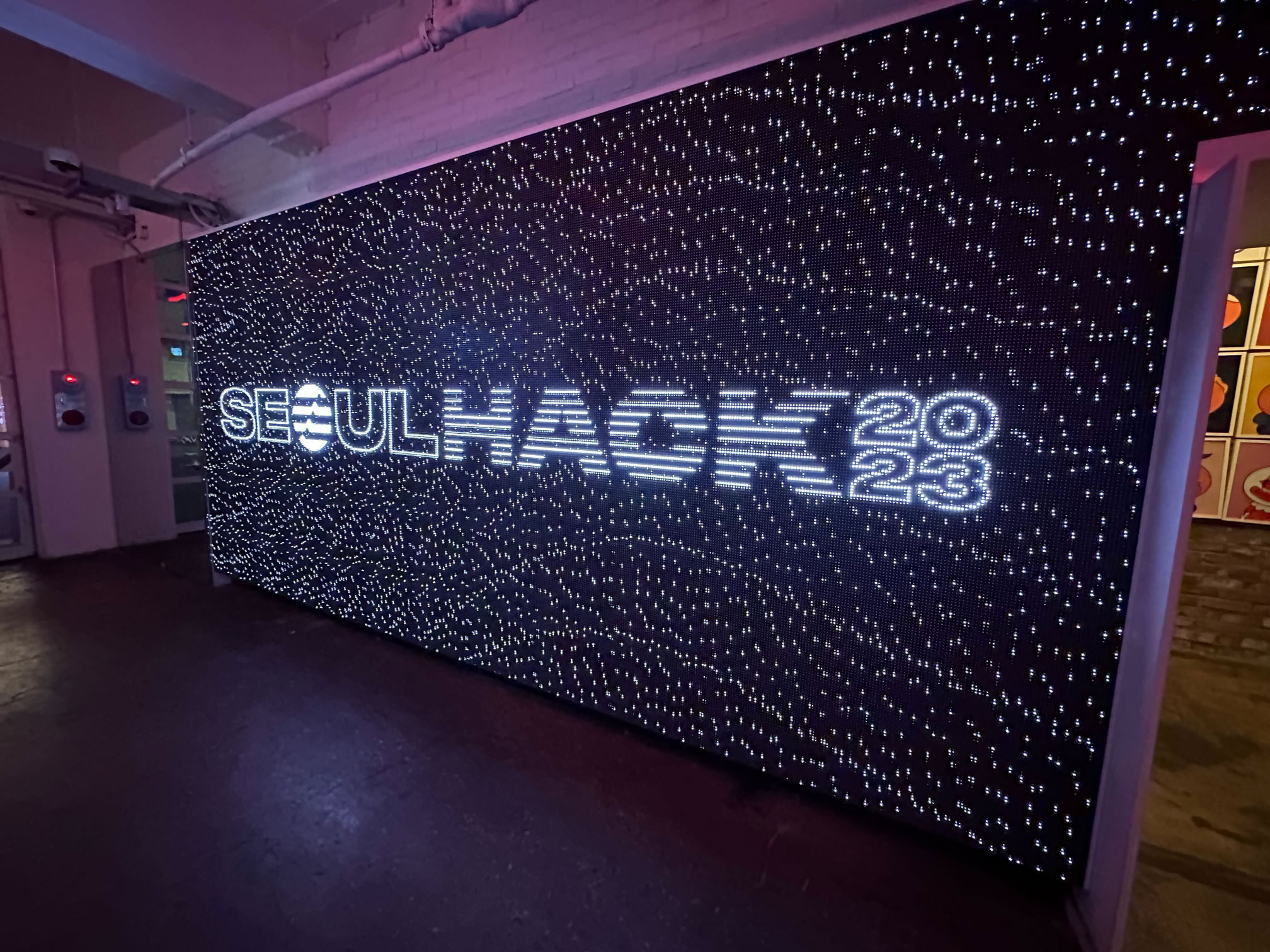 Aptos Seoul Hack 2023 hackathon event in Seoul, South Korea LED display board with event logo